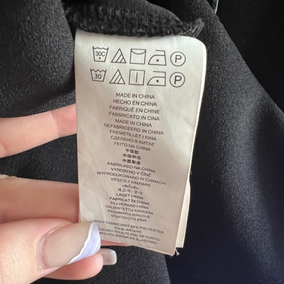 Michael Kors midi knit black dress with short flutter sleeves. - Picture 3 of 3